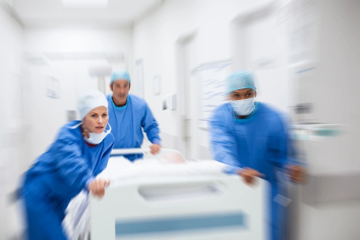 doctors transferring a patient